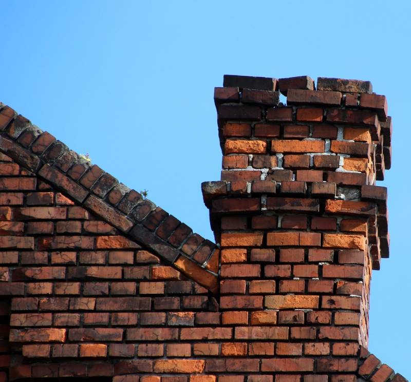 Damaged chimney on an Braintree home showing cracks and missing mortar